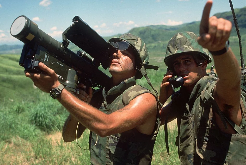 FIM-92 Stinger man-portable air defense missile system shown for reference.