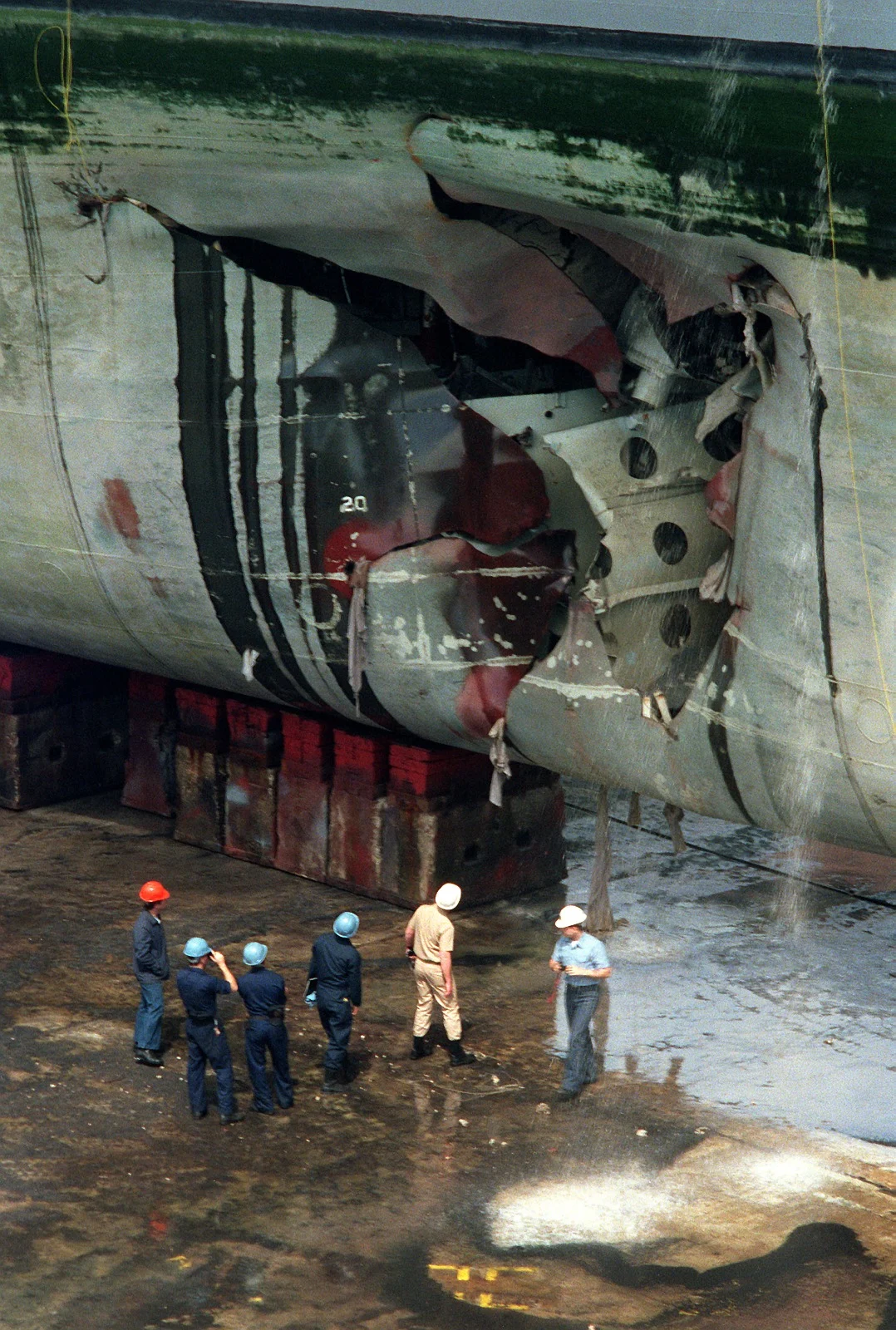 USS Tripoli damaged by sea mine in 1991 after Gulf War showing risks similar to Strait of Hormuz sea mines crisis affecting global shipping
