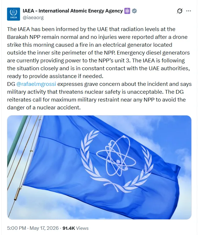 Screenshot of an official X post by the IAEA confirming that the Barakah nuclear plant drone strike caused a generator fire but left radiation levels normal.